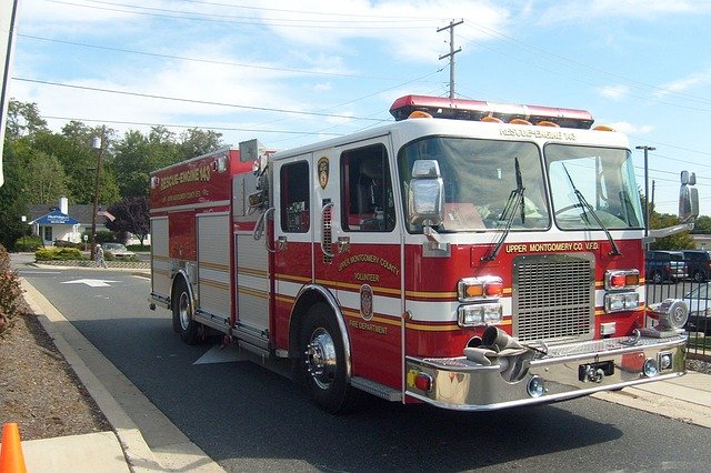 Close up of a fire truck.  A manufacturing disaster recovery plan helps keep fire trucks far away. 