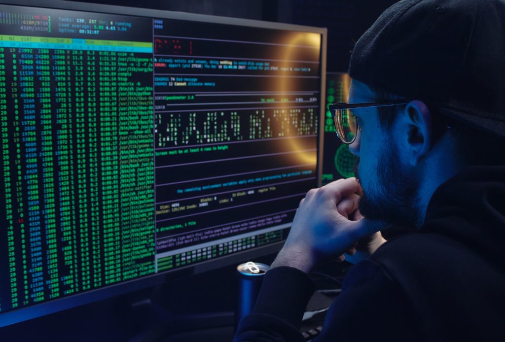 A man looks at data. Machine learning applications quickly identifies patterns in data.