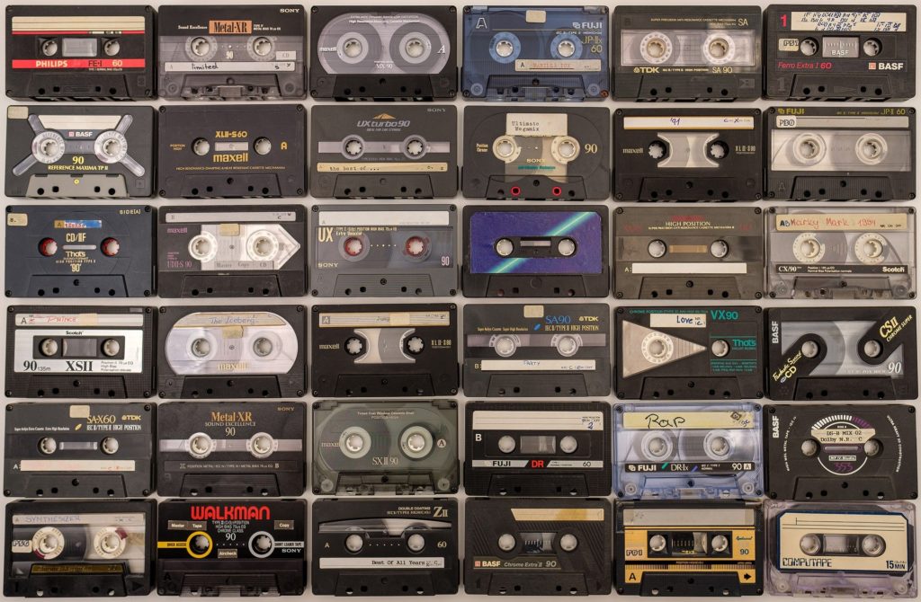 A wall of analog cassette tapes.  Audiophiles have waged the analog vs digital ware for years. 
